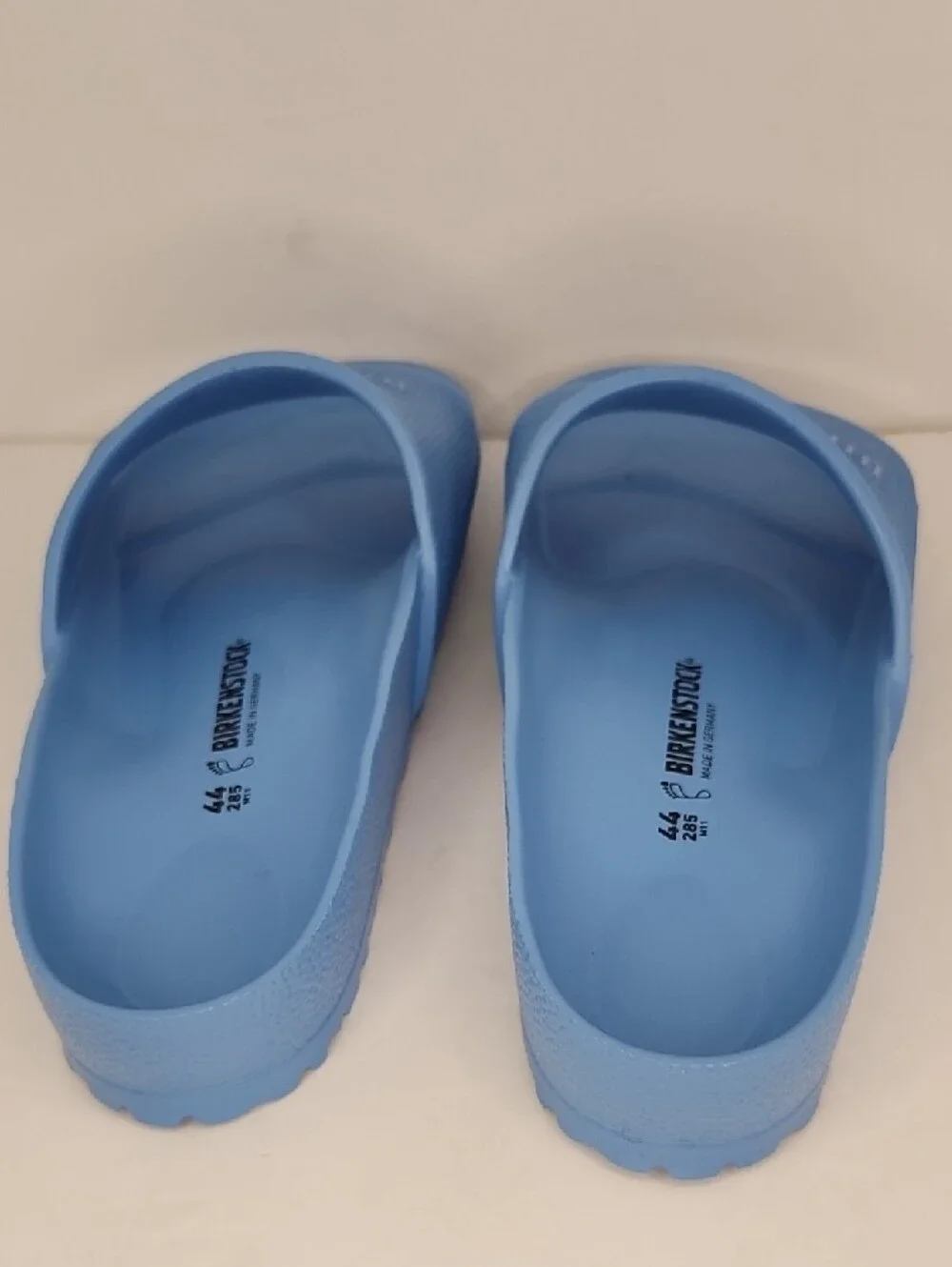 Birkenstock Light Blue Slide Sandals with Embossed Strap